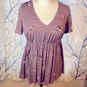 Torrid women’s size 00 print short sleeve blouse.